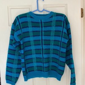 Woman’s vintage plaid sweater
